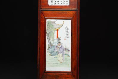 A Chinese carved wooden panel with famille rose Wang Qi 王琦-style plaques, dated 1932