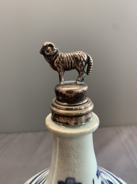 Three Japanese blue and white Arita 'birds among flowering branches' pharmacy bottles, Edo, 18th C.