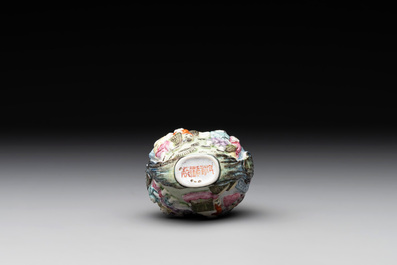 A Chinese molded famille rose 'playing boys' snuff bottle, Qianlong mark, 19th C.
