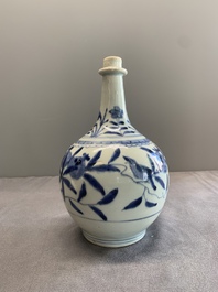 Three Japanese blue and white Arita 'birds among flowering branches' pharmacy bottles, Edo, 18th C.