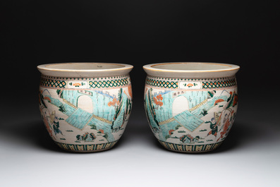 A pair of Chinese Nanking famille verte 'warriors' fish bowls, 19th C.