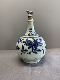 Three Japanese blue and white Arita 'birds among flowering branches' pharmacy bottles, Edo, 18th C.