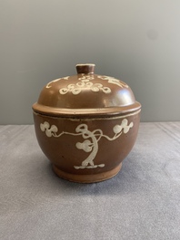 A Chinese slip-decorated brown-glazed 'three friends of winter' bowl and cover, Zhushan kilns, late Ming