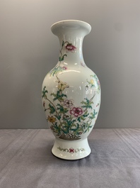 A Chinese famille rose vase with floral design, Qianlong mark, 19/20th C.