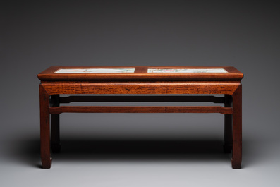 A Chinese hardwood low table with two famille rose plaques, Republic