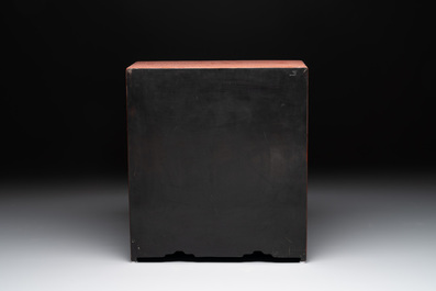 A Chinese cinnabar lacquer 'mountainous landscape' cabinet, 19th C.