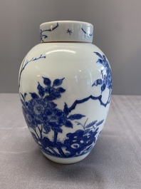 A Chinese blue and white jar and cover with birds among flowering branches, Transitional period