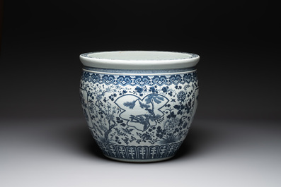 A large Chinese blue and white fish bowl with birds, deer, insects and flowering branches, 19th C.
