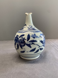 Three Japanese blue and white Arita 'birds among flowering branches' pharmacy bottles, Edo, 18th C.