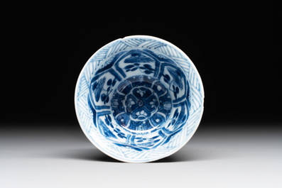 A Chinese blue and white reticulated double-walled cup and saucer, lingzhi mark, Kangxi