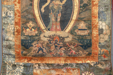 A Tibetan thangka depicting Padmapani, 19th C.