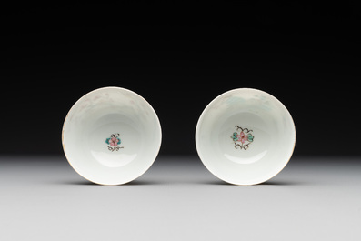 A pair of Chinese famille rose 'beloved by the river' cups and saucers, Yongzheng
