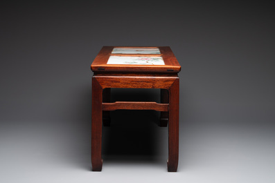 A Chinese hardwood low table with two famille rose plaques, Republic