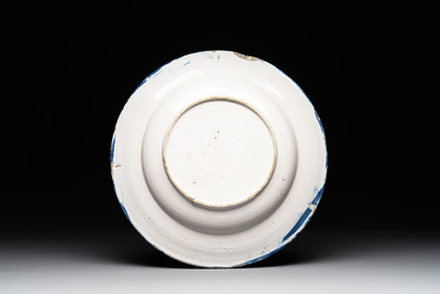 A Dutch Delft blue and white 'biblical subject' dish, 17th C.