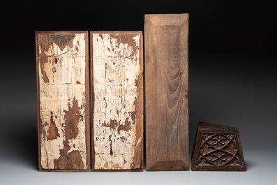Three Gothic carved oak panels and a stand, France and Flanders, 15th C.