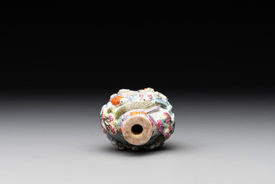 A Chinese molded famille rose 'playing boys' snuff bottle, Qianlong mark, 19th C.