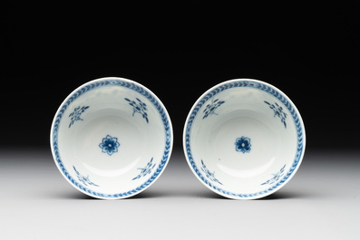 A pair of Chinese blue and white 'Catholic subject' cups and saucers with Madonna and child, Kangxi