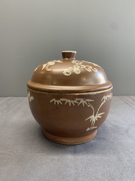 A Chinese slip-decorated brown-glazed 'three friends of winter' bowl and cover, Zhushan kilns, late Ming