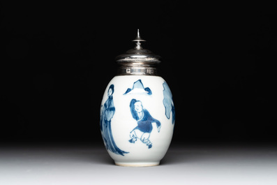A Chinese blue and white 'Long Eliza and playing boys' tea caddy with silver mount and cover, Kangxi