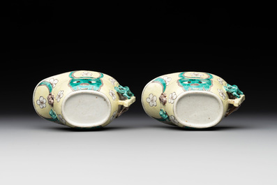 A pair of fine Chinese sancai-glazed 'Buddhist lion and chilong' libation cups, Kangxi