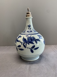 Three Japanese blue and white Arita 'birds among flowering branches' pharmacy bottles, Edo, 18th C.