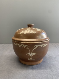 A Chinese slip-decorated brown-glazed 'three friends of winter' bowl and cover, Zhushan kilns, late Ming