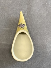 Two Chinese sancai-glazed shoes with flowers and butterflies design, Kangxi