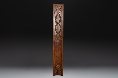 Two ornately carved pine and walnut panels, France, 18th C.