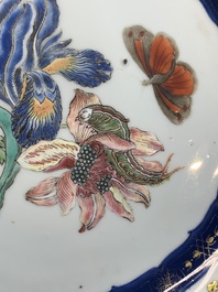 A pair of Chinese famille rose 'botanical' plates after Maria Sybilla Merian, Qianlong