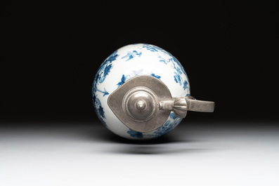 A Dutch Delft blue and white pewter-mounted armorial jug, late 17th C.