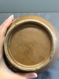 A Chinese slip-decorated brown-glazed 'three friends of winter' bowl and cover, Zhushan kilns, late Ming