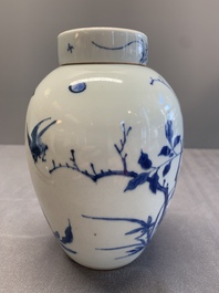 A Chinese blue and white jar and cover with birds among flowering branches, Transitional period