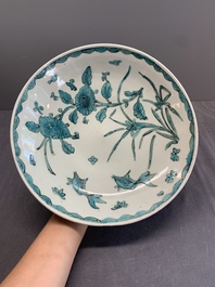 A Chinese Swatow turquoise- and black-enamelled 'carp, narcissus and chrysanthemum' plate and a tomobako, Ming