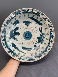 RETURNED 10/12/24 Two Chinese Swatow red-, turquoise- and black-enamelled 'phoenixes' and 'river landscape' dishes, Ming
