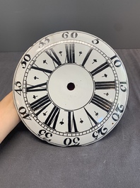 An English Delftware clock face dial with Roman numerals, 18th C.