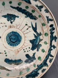 RETURNED 10/12/24 Two Chinese Swatow red-, turquoise- and black-enamelled 'phoenixes' and 'river landscape' dishes, Ming