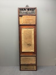 A Chinese carved wooden panel with famille rose Wang Qi 王琦-style plaques, dated 1932