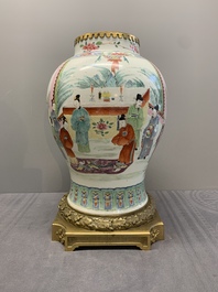 A Chinese famille rose gilt bronze mounted vase with figural design, Yongzheng