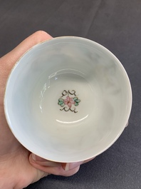 A pair of Chinese famille rose 'beloved by the river' cups and saucers, Yongzheng