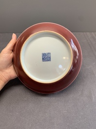 A Chinese copper-red-glazed plate, Qianlong mark and of the period