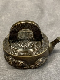 A Japanese bronze 'shishi lions' water dropper, Meiji, 19th C.