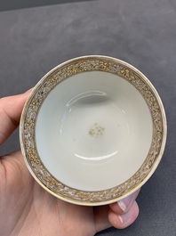 A fine Chinese Canton famille rose 'mandarin subject' cup and saucer, Qianlong