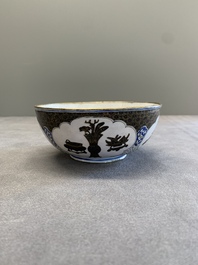 A pair of Chinese Canton enamel 'antiquities' bowls, Yongzheng/Qianlong