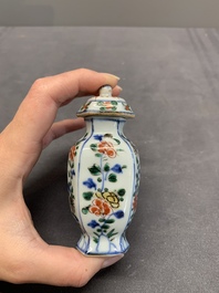 A rare Chinese famille verte garniture of five miniature vases with floral design, Kangxi