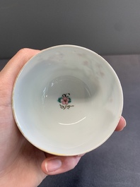 A pair of Chinese famille rose 'beloved by the river' cups and saucers, Yongzheng