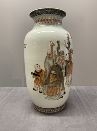 A Chinese gilt-decorated iron-red and grisaille lantern-shaped vase, signed Zhou Xiangpu 周湘浦, Ya Wan Zhen Cang 雅玩珍藏 mark, 20th C