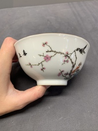 A Chinese famille rose bowl with birds amongst branches, 20th C.