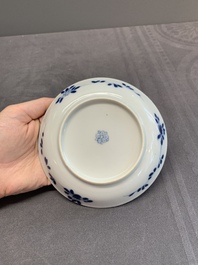 A pair of Chinese blue and white 'Catholic subject' cups and saucers with Madonna and child, Kangxi