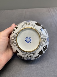 A pair of Chinese Canton enamel 'antiquities' bowls, Yongzheng/Qianlong