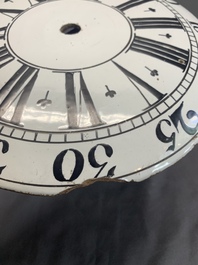 An English Delftware clock face dial with Roman numerals, 18th C.